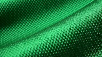 Green football jersey with air mesh texture. Athletic wear backdrop photo