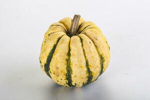 Ripe raw fresh decorative pumpkin photo
