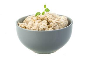 Oats porridge in the bowl photo