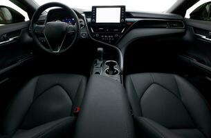 Inside moden car background, car elements and interior wallpaper photo