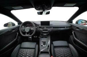 Inside moden car background, luxury car interior elements wallpaper. Black leather car interior photo