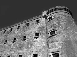 Old celtic castle tower walls, Cork City Gaol prison in Ireland. Fortress, citadel background photo