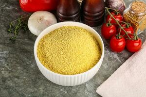 Raw dry wheat couscous grain photo