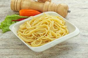 Italian pasta boiled spaghetti with oil photo