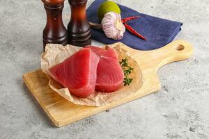 Delicous raw tuna steak for cooking photo