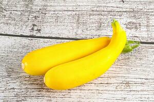 Yellow young zucchini for cooking photo