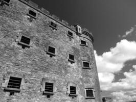 Old celtic castle tower walls, Cork City Gaol prison in Ireland. Fortress, citadel background photo