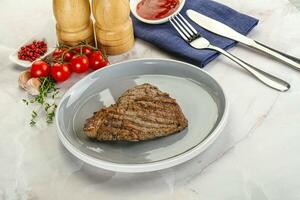 Grilled marble beef steak with sauce photo