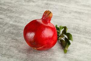 Ripe red sweet and juicy Pomegranate photo