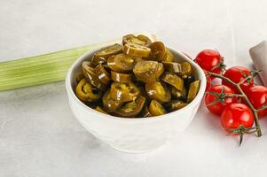 Sliced canned jalapeno pepper photo