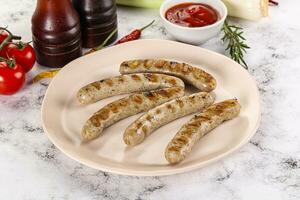 Grilled natural organick white sausages photo