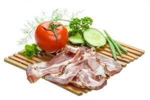 Bacon with vegetables photo