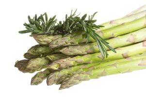 fresh asparagus spears with rosemary isolated on white photo