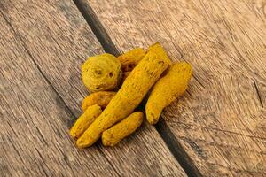 Indian spices - Turmeric root Curcuma photo