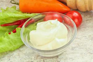 Organic mayonnaise sauce in the bowl photo