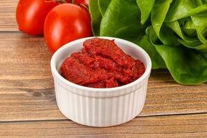 Tomato puree sauce for cooking photo