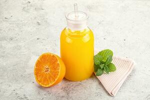 Fresh orange juice served mint photo