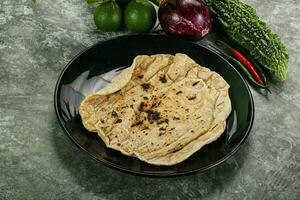 Indian traditional tandori bread - Roti photo