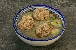 Soup with vegetables and meat balls photo