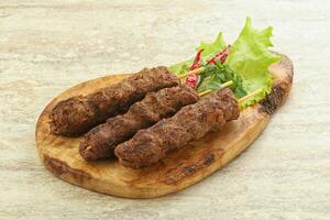 Beef kebab skewer minced meat photo