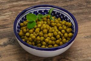 Canned Green peas in the bowl photo