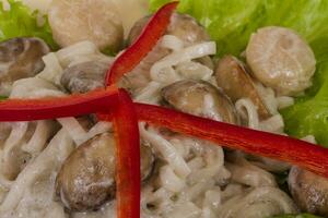 Popular Japanese Dish, with scallops and mushrooms photo