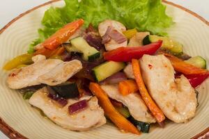 Grilled vegetables and chicken fillet photo