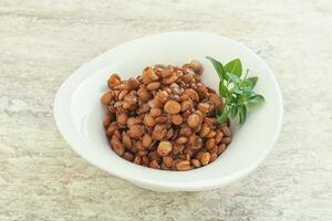 Boiled lentil in the bowl photo