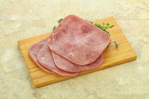 Sliced Beef Ham over board photo