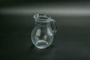 Empty glass jug for liquid photo