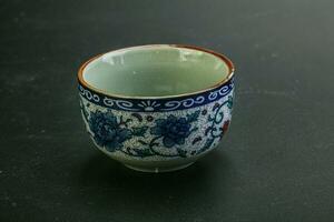 Empty Chinese cup for tea photo