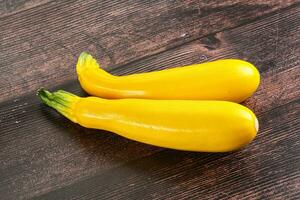 Yellow young zucchini for cooking photo