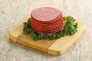 Sliced salami pork sausage snack photo