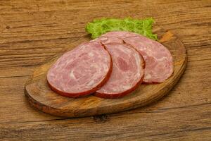 Slices of pork meat ham photo