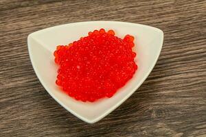 Red salmon caviar in the bowl photo