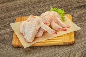 Raw chicken wings for cooking photo