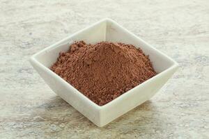 Natural organic cocoa powder for culinary photo