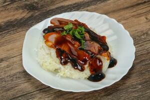 Rice with duck breast in Unagi sauce photo