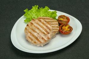 Grilled tuna steak with kumato photo