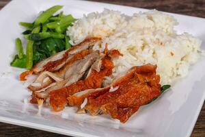 Rice with roasted duck breast photo