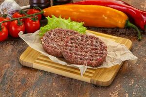 Raw burger cutlet photo