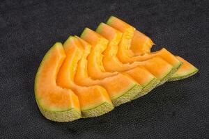 Sliced tasty sweet sliced melon photo