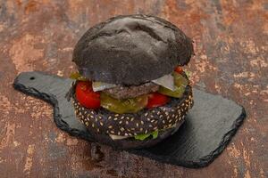 Tasty black burger photo