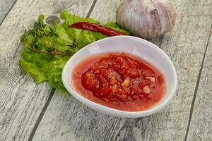 Spicy tomato and garlic sauce photo