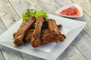 Roasted pork ribs photo