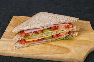 Club sandwich with ham and cheese photo