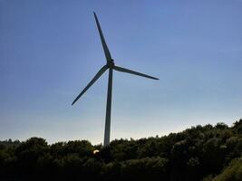 Wind power plant rotor close view. Windpower generator. Green energy, eco friendly industry concept photo