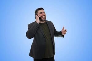 Smiling Adult Man Shouting Under Clear Blue Sky with Open Mouth photo