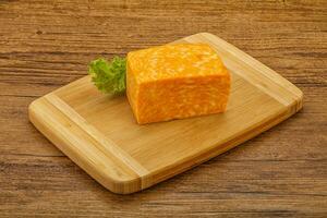 Marble cheese brick over board photo