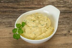 Hummus snack with olive oil photo